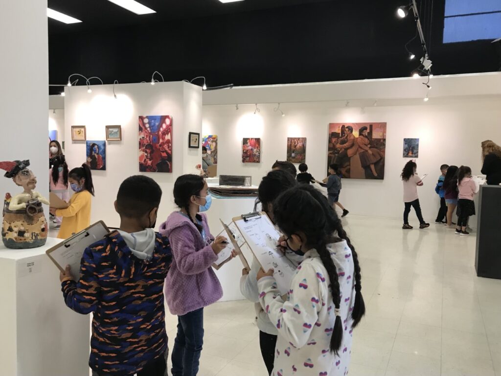 Children on a field trip in the gallery